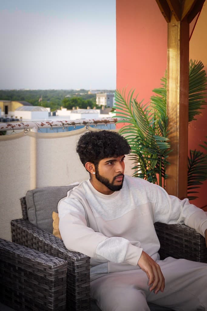 Dhruv Hegde — portrait on a rooftop terrace at golden hour, University of Michigan software engineer